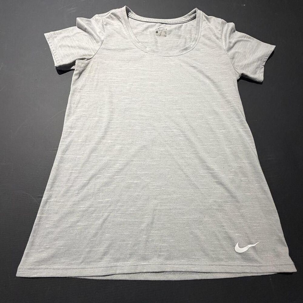 Women’s Nike grey Dri-Fit short sleeve top size small.